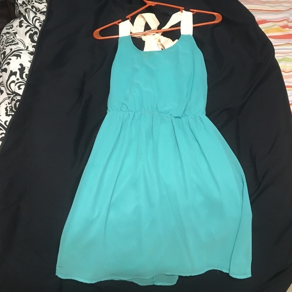 Turquoise dress with tie up bow in back