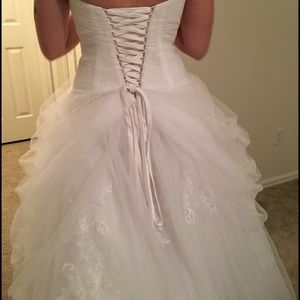 Wedding dress never worn. Still has tags