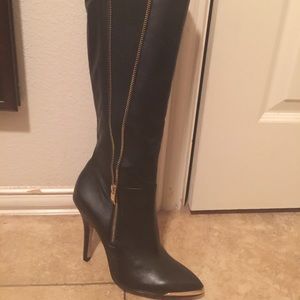 Vince Camuto black leather boots with gold zipper