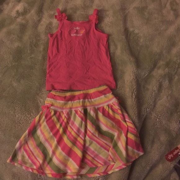 Tank top with a skirt has built in shorts