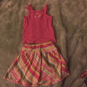 Tank top with a skirt has built in shorts