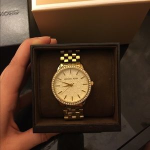 Never worn Michael Kors woman's watch