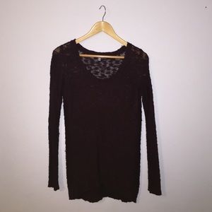 sweater with medium/small knit holes. Gently used
