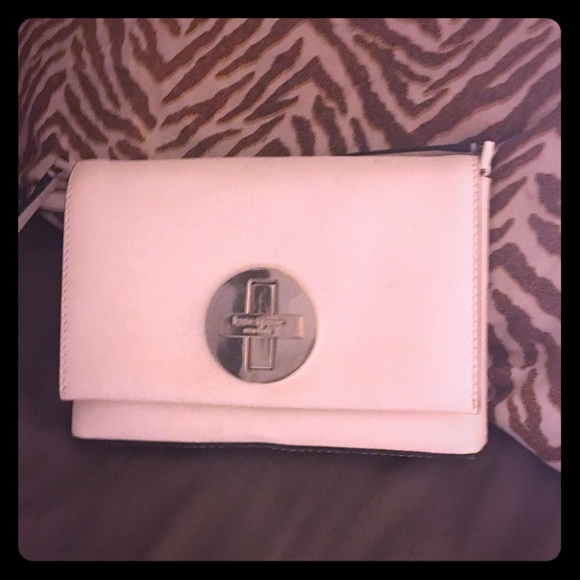 Cream colored Kate Spade crossbody handbag