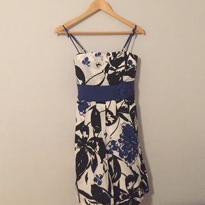 Once worn. Strap broken but can be worn strapless.