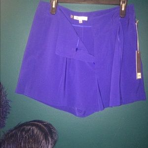 Royal blue JLo dress pants.