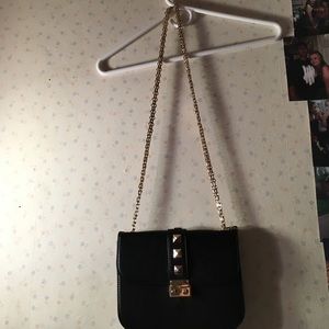 black and gold purse