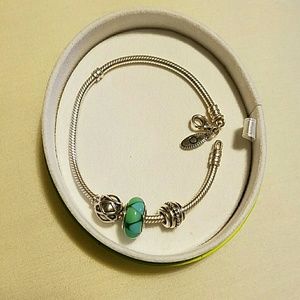 Pandora bracelet with 3 Pandora charms