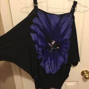 Adorable cold shoulder flower top!