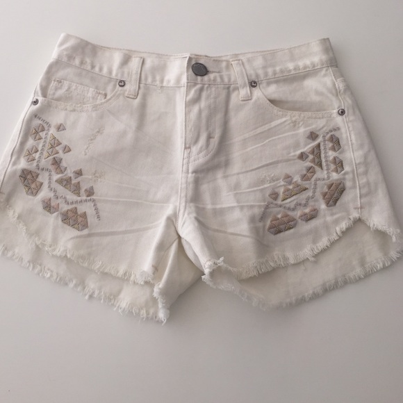 Free People white jean shorts