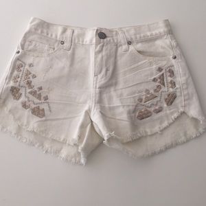 Free People white jean shorts