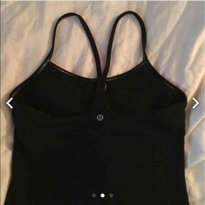 On hold! Lululemon black power y tank. Please read