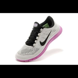 White and pink nike free 3.0