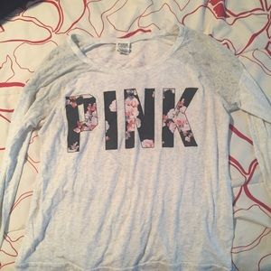 White With floral design in the letters from Pink