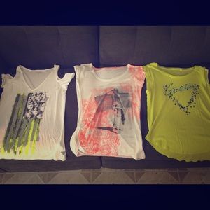 3 Guess T-shirts.