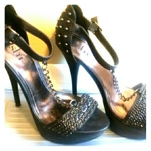 Sexy black stilettos with chain and stud details