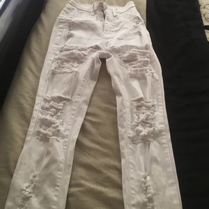 Jeans ripped holes, worn once, too little for me