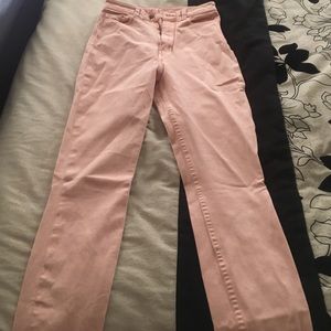 Pink skinny jeans with zipper on the bottom