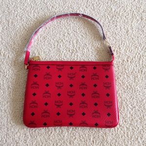 🚫SOLD🚫NEW 💯% Authentic MCM pouch/cluth