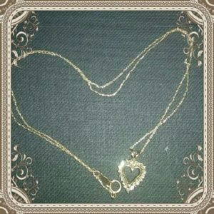 From Kay's 10 K gold & diamond pendant necklace