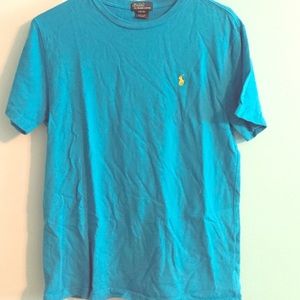 Bright blue polo shirt with yellow logo