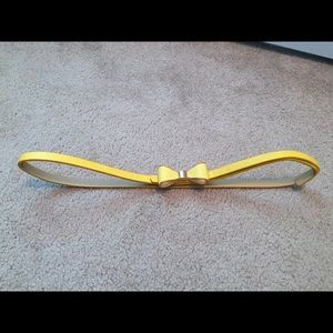 Thin yellow bow belt