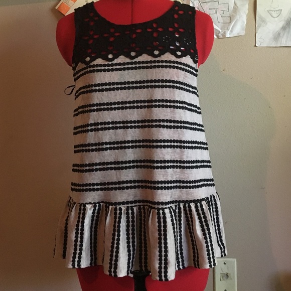 Tan and black peplum tank