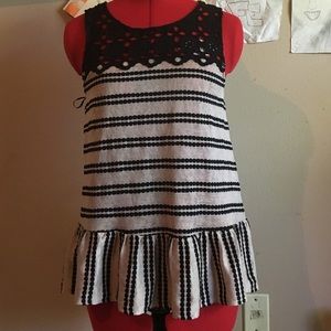 Tan and black peplum tank