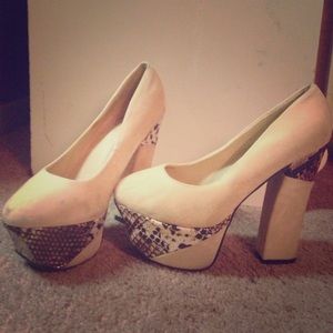 Platform heels that has only been worn 4 times.