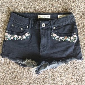 Black denim cutoff shorts