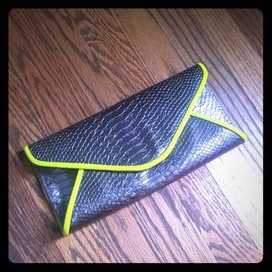 Metallic clutch with neon yellow trim