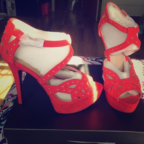 New red heels in size 8