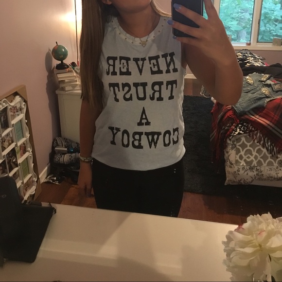"never trust a cowboy" top