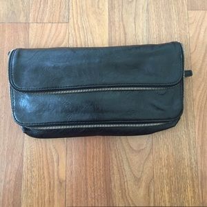 Vegan leather zipper clutch.