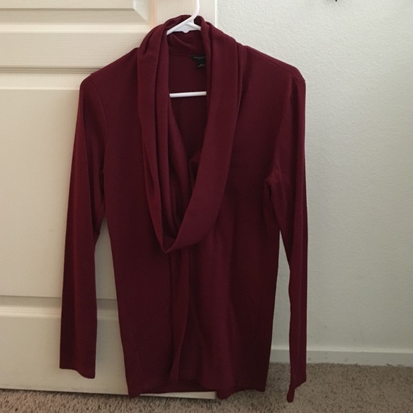 Burgundy sweater with a scoop neck.