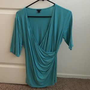 Turquoise 3/4 sleeve top with ruching.