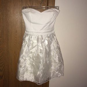 White sweetheart cut dress.