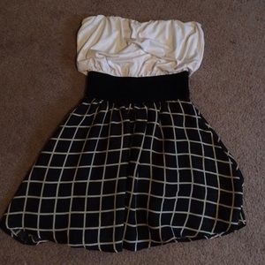 Black and Tan strapless dress.