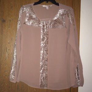 Mauve blouse.