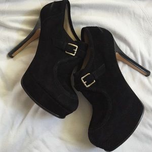 On hold.    Michael kors black suede botie size 8!