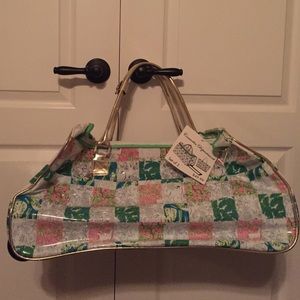 Cute plastic rolling luggage!