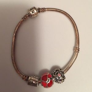 Pandora bracelet with three charms