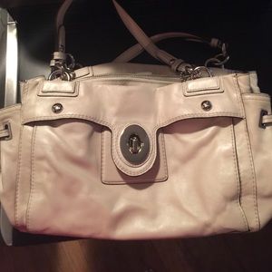 Creme coach purse