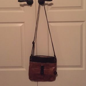Brown The Sak purse barely used!