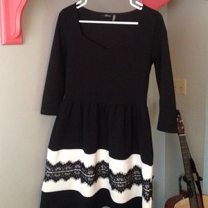Formal black and white quarter sleeve dress