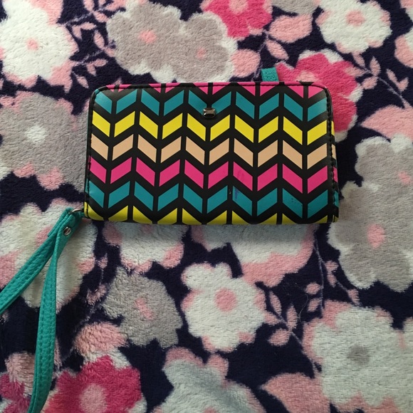 Cute wallet holds iPhone