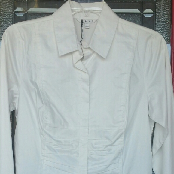 CAbi long sleeve white polished cotton blouse.