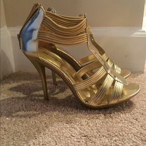 Gold gladiator stilettos