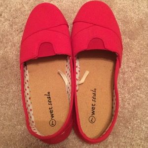 Red slip on shoes from wet seal size 7