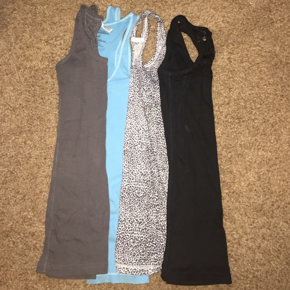 Bundle of 4 thicker strapped tank tops!